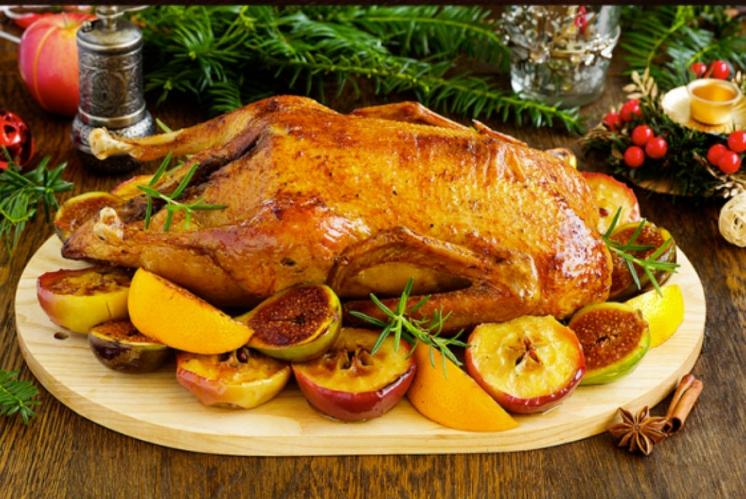 Duck with apples baked in the oven.
