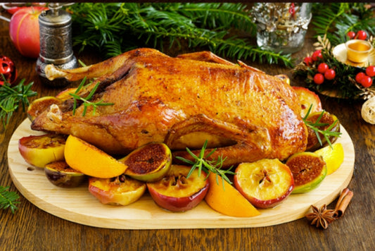 Duck with apples baked in the oven.